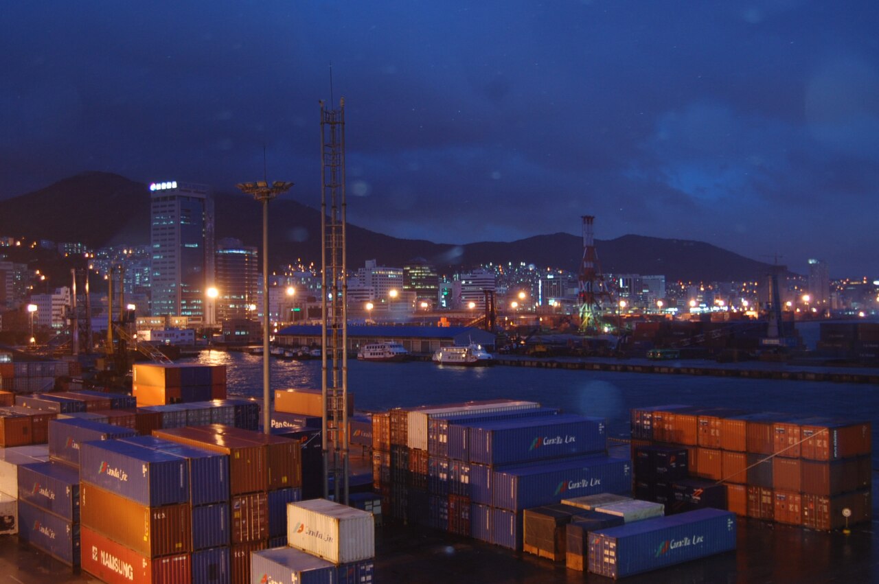 Rows of shipping containers at a port terminal